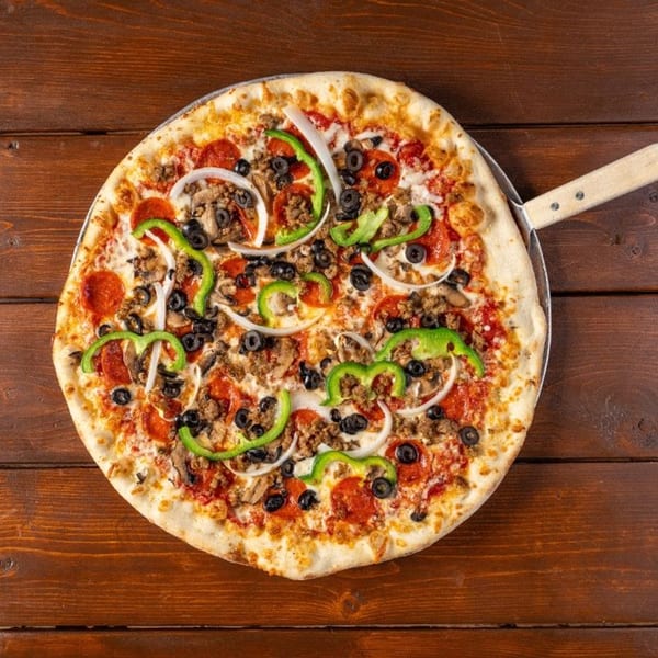 New York Pizza Pub's supreme pizza with pepperoni, sausage, olives, onions, and green peppers.